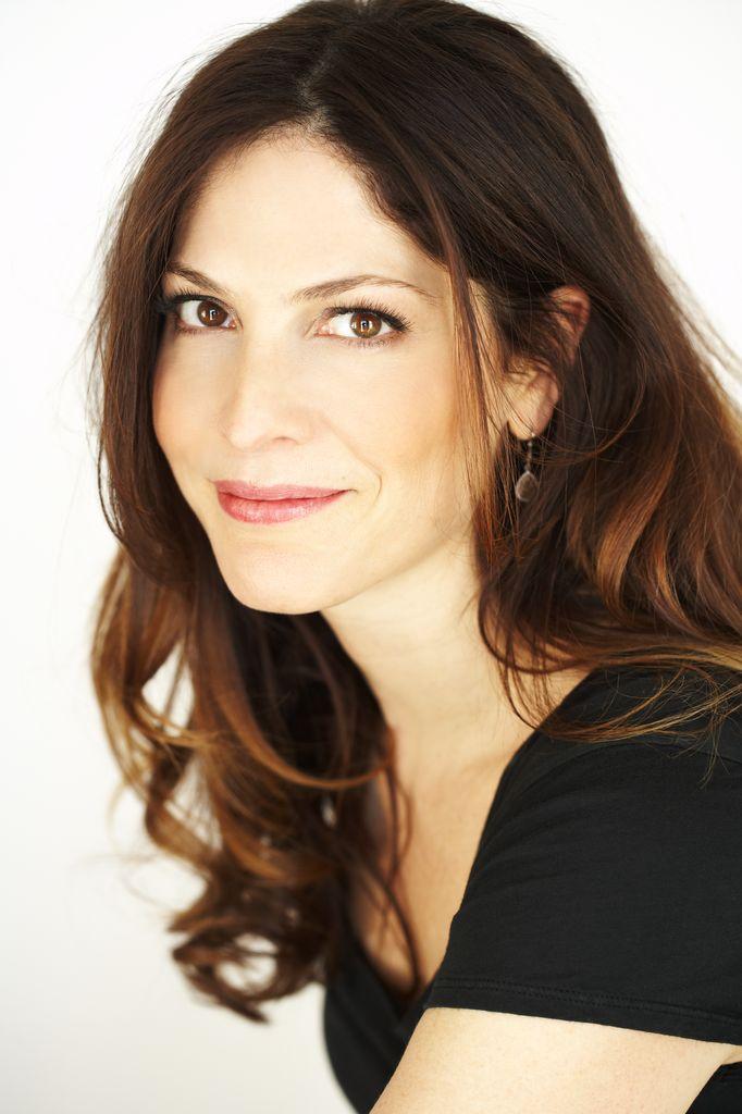 Photo of Lori Silverbush smiling at the camera.