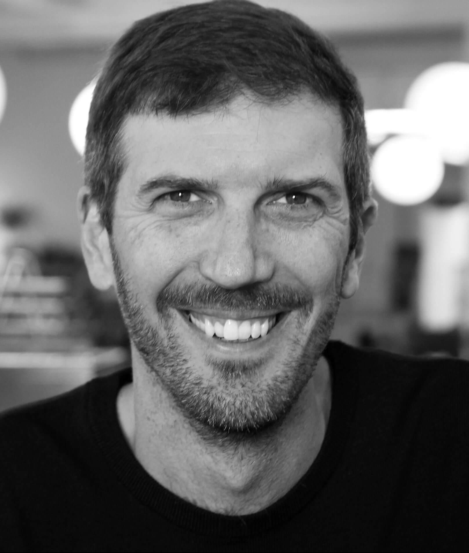 A photo of Producer Bob Moore. Black and white portrait.